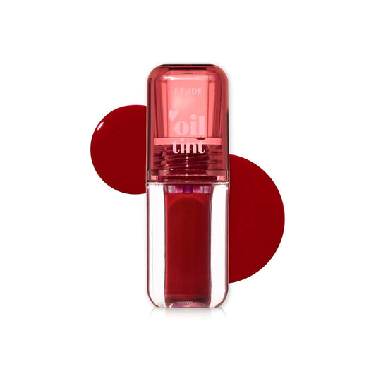 Red lip gloss with a clear cap on a white background