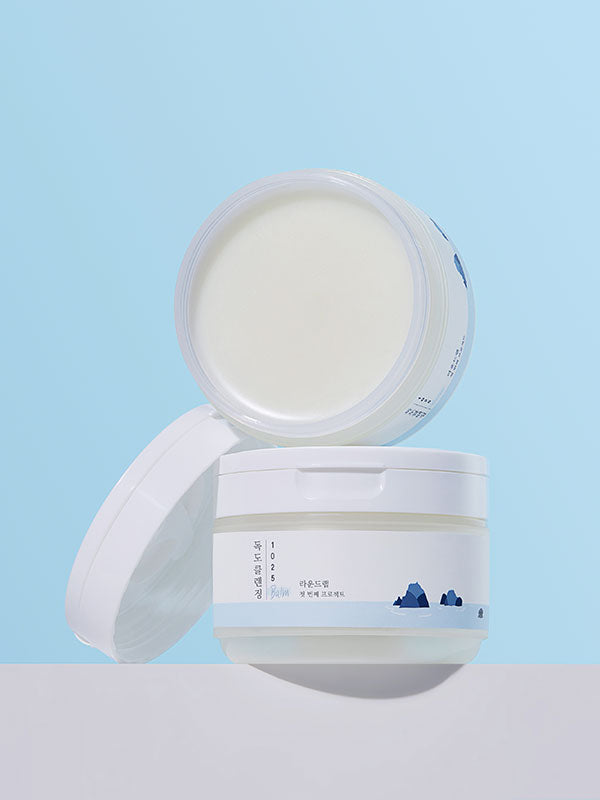 Round Lab 1025 Dokdo Cleansing Balm melting into oil on skin
