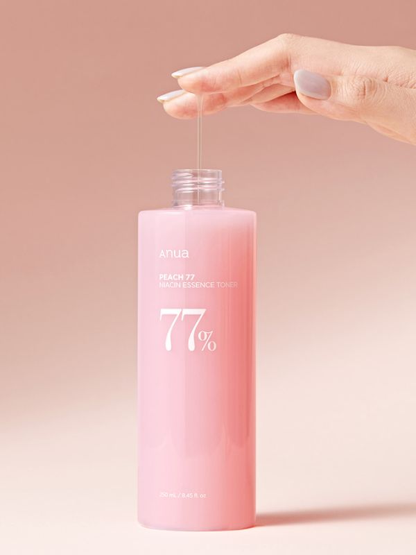 Anua Peach 77 Essence Toner with Peach Melting Peel technology for radiant skin