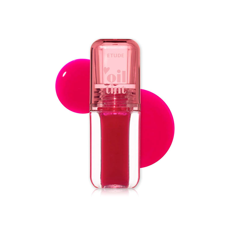 Pink lip gloss with a clear cap on a white background