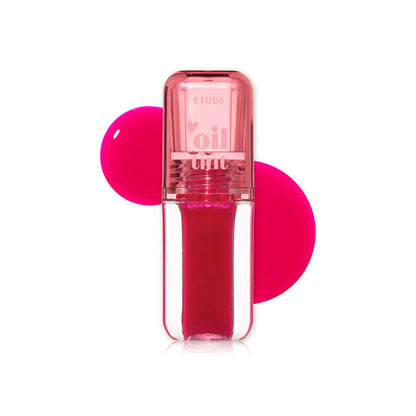 Pink lip gloss with a clear cap on a white background